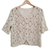 CHAQUETA BEIGE  TEJIDA CON BOTONES 600